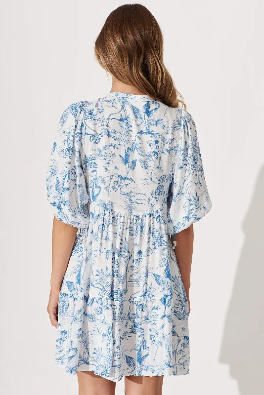 emelyn-dress-in-white-with-blue-palm-print