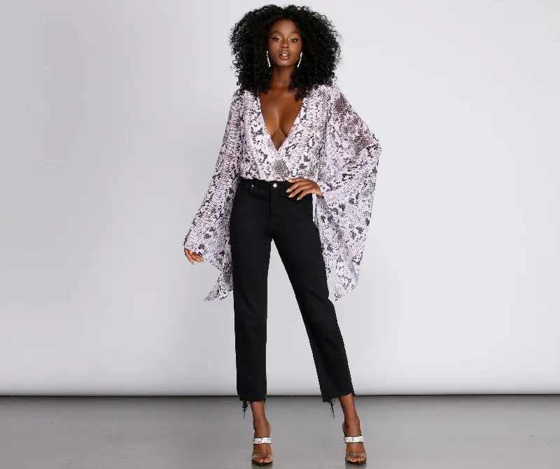 the-drama-bell-sleeve-bodysuit-060030108999